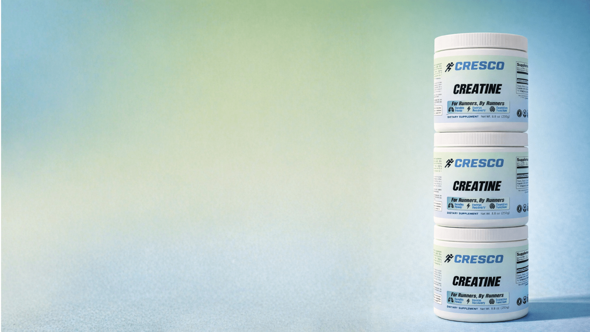 Three CRESCO Creatine Monohydrate jars stacked on a light blue and green background
